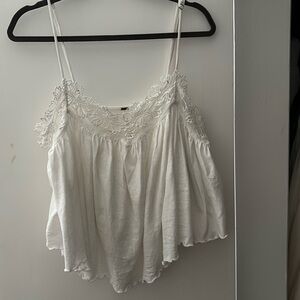 Free people loose white tank with lace, size M